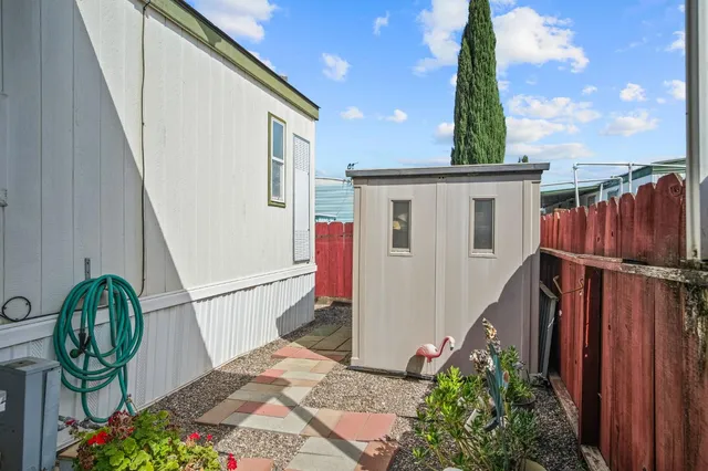 a bedroom with a bed and dresser