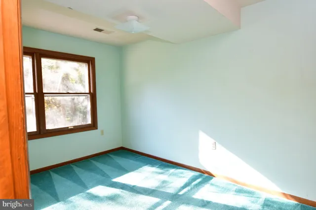 a view of a room with a window