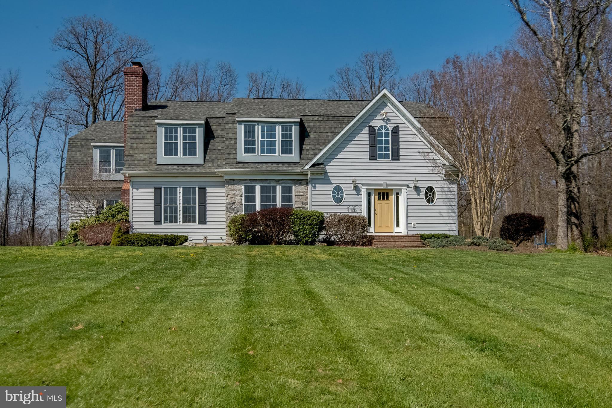 2501 Braddock Road Mount Airy, MD 21771 - Photo 1 of 30 a front view of a house with a yard