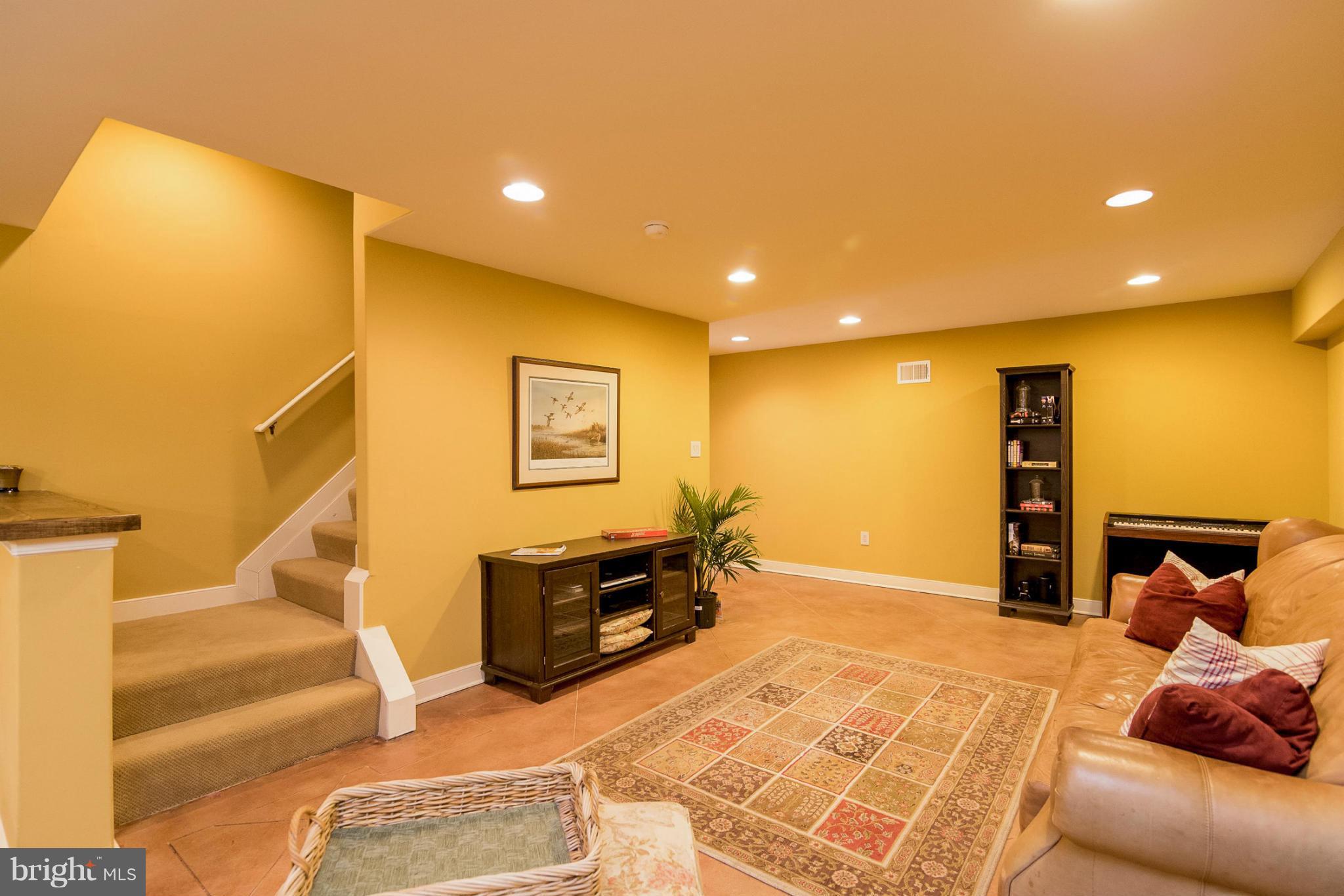 2501 Braddock Road Mount Airy, MD 21771 - Photo 16 of 30 a bed room with a bed and a lamp
