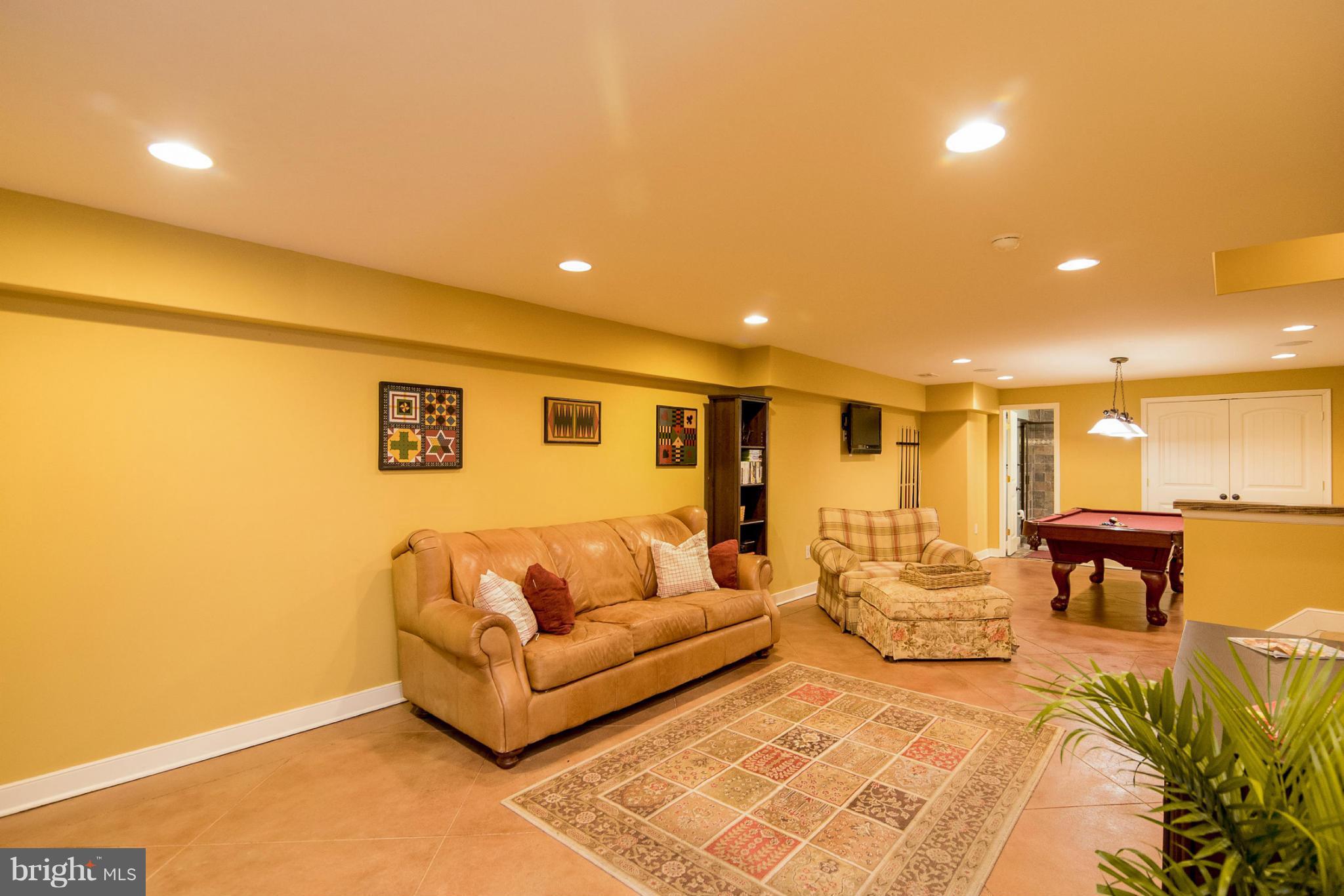 2501 Braddock Road Mount Airy, MD 21771 - Photo 17 of 30 a living room with furniture and a table