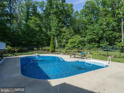 2501 Braddock Road Mount Airy, MD 21771 - Photo 29 of 30 a view of a swimming pool with a yard