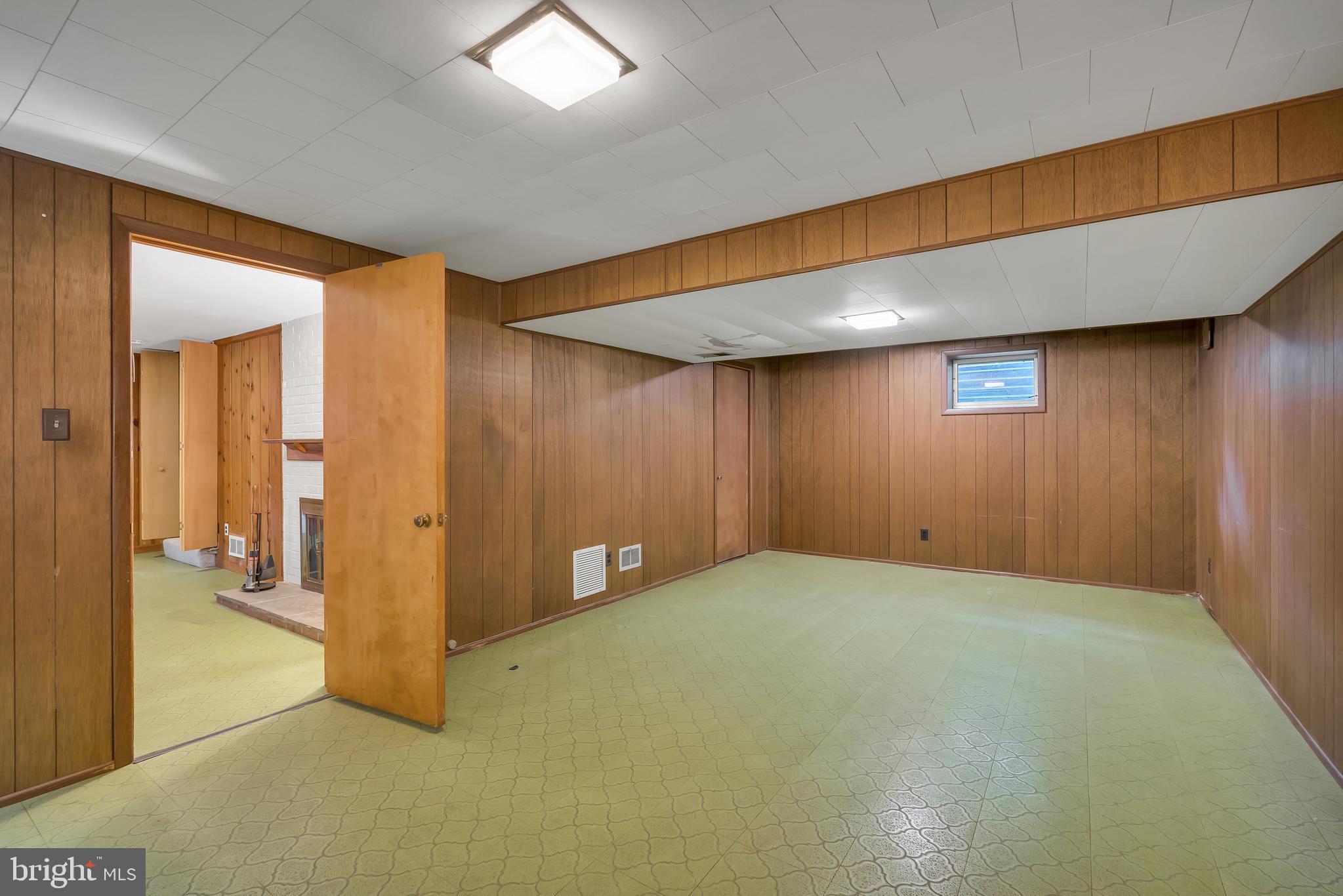 5523 Trent Street Chevy Chase, MD 20815 - Photo 26 of 42 Versatile Playroom/Ping Pong Room
