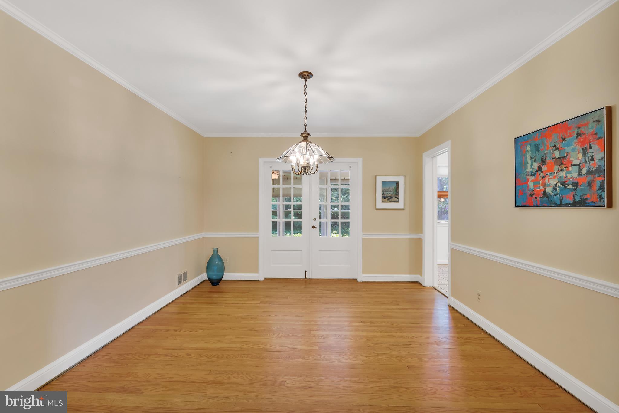 5523 Trent Street Chevy Chase, MD 20815 - Photo 5 of 42 Dining Room with Chair Rail Molding