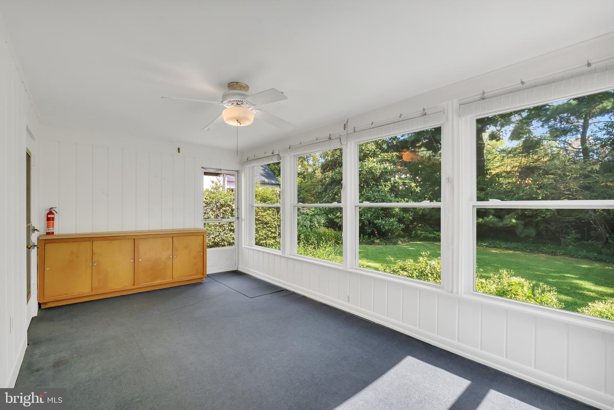 5523 Trent Street Chevy Chase, MD 20815 - Photo 8 of 42 Tranquil Sunroom with access to garage and yard