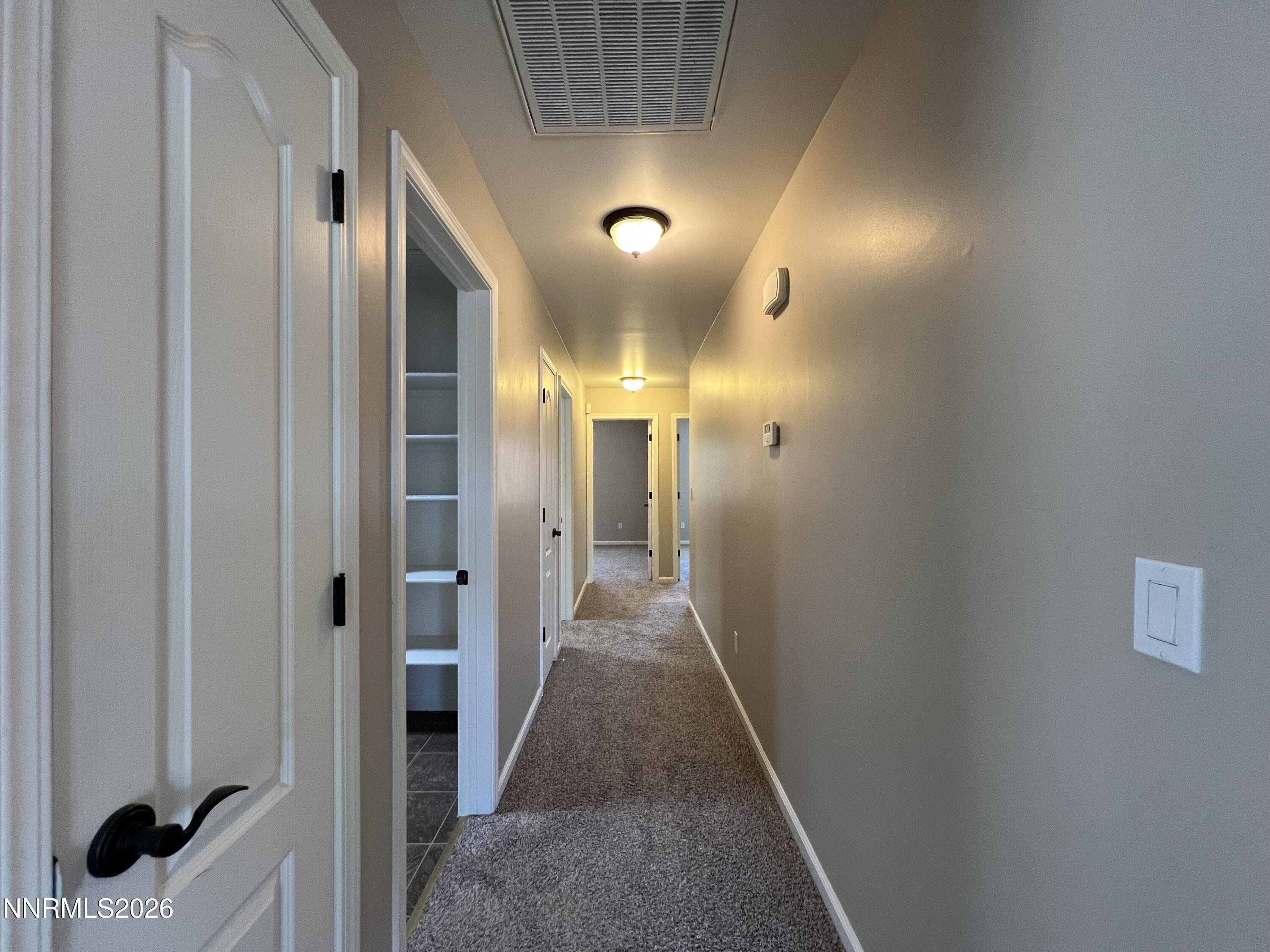 18406 Teddy Bear Court Reno, NV 89508 - Photo 34 of 44 a view of a hallway