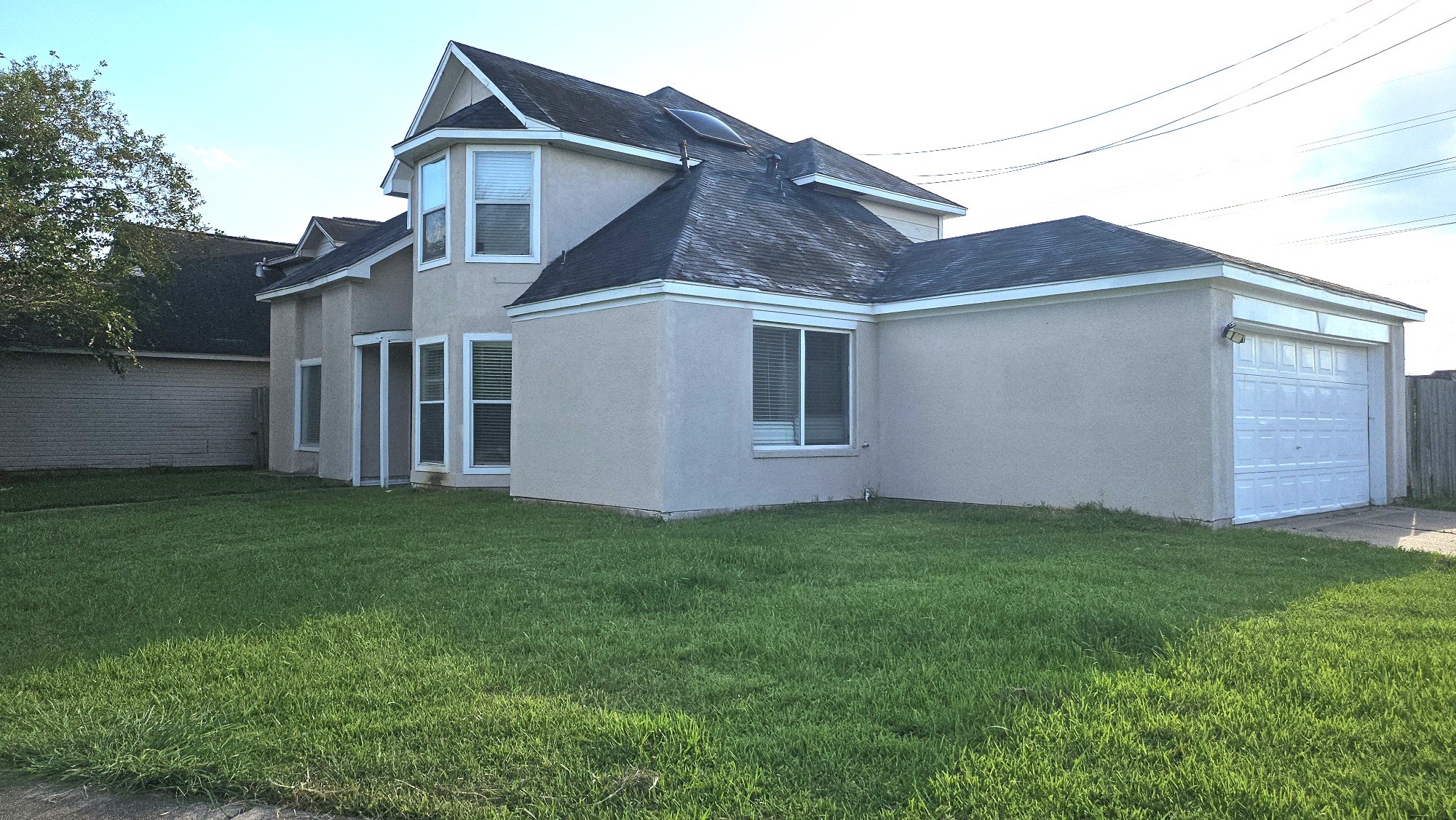 7218 Caddo Lake Lane Houston, TX 77083 - Photo 2 of 19 a view of a back yard of the house