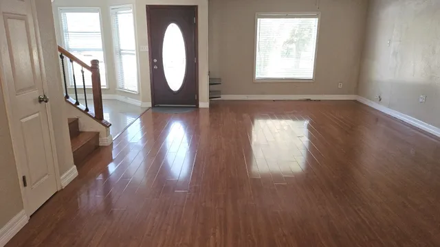 a view of entryway with wooden floor
