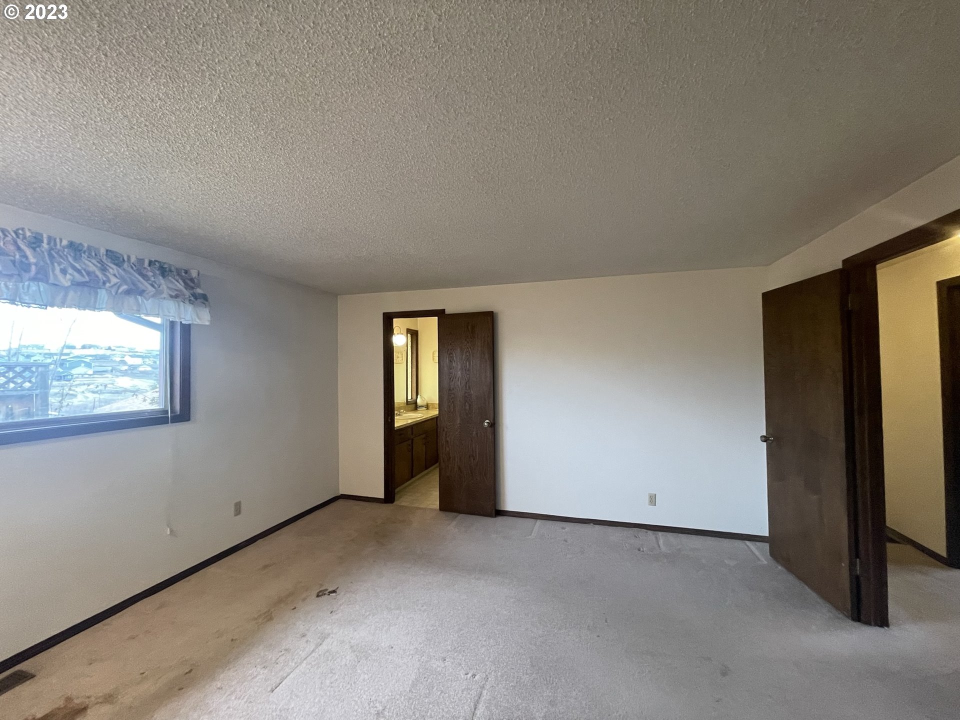 1848 Southwest Athens Way Pendleton, OR 97801 - Photo 20 of 28 a view of an empty room with a window