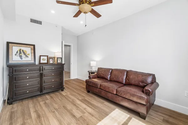 a living room with couches and furniture