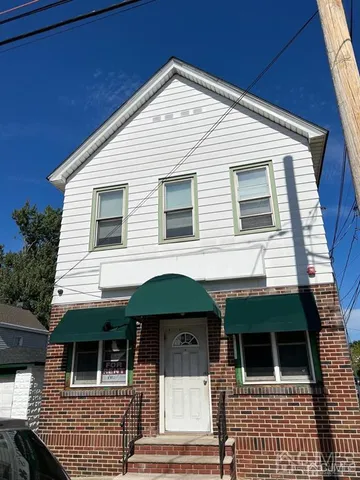 a front view of a house with balcony