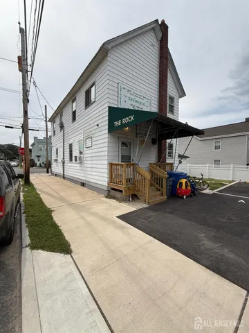 a front view of a house with a garage