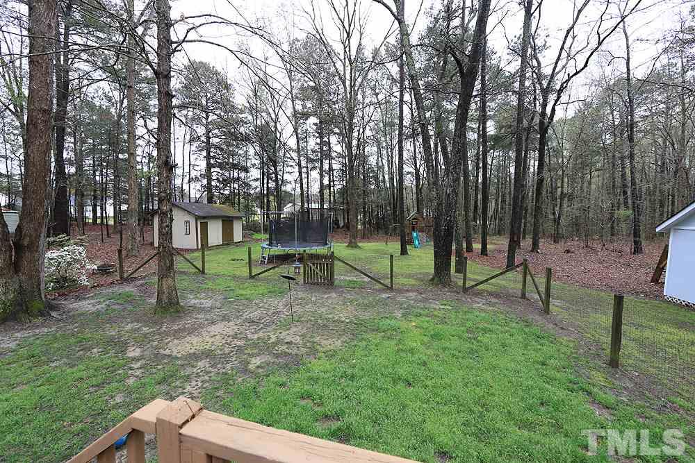 204 Lassiter Farm Road Raleigh, NC 27603 - Photo 29 of 30 The owners have fenced a portion of the yard for the dog. They can leave it or remove it.