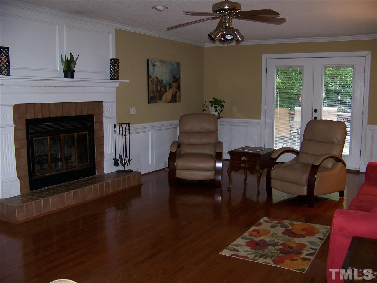 2809 Halfhitch Trail Raleigh, NC 27615 - Photo 3 of 17 SPACIOUS FAMILY ROOM WITH HARDWOODS AND FIREPLACE, LARGE ENOUGH TO MAKE TWO ROOMS! OVERLOOKS DECK AND BACKYARD. FLOWS INTO BREAKFAST/KITCHEN AREAS