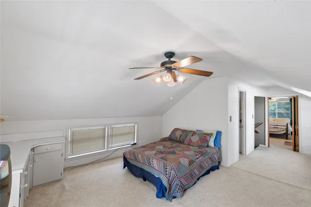 a view of a kitchen with a sink and dishwasher a refrigerator with wooden floor