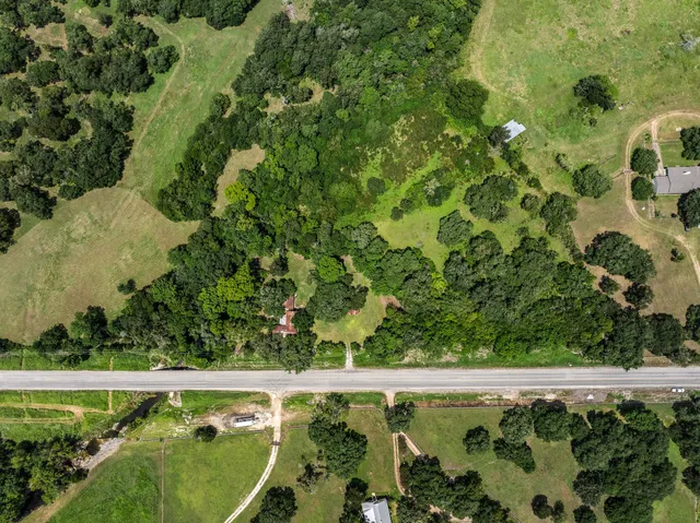 a view of a swimming pool with a garden