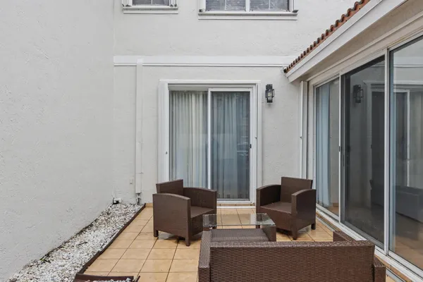 a view of a outdoor space with lounge chair