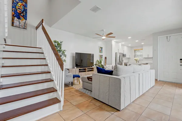 a kitchen with sink cabinets and window