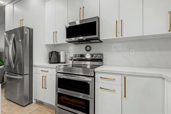 a view of a dining room with furniture and window