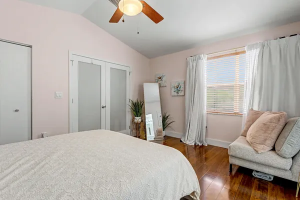 a bedroom with furniture and a couch