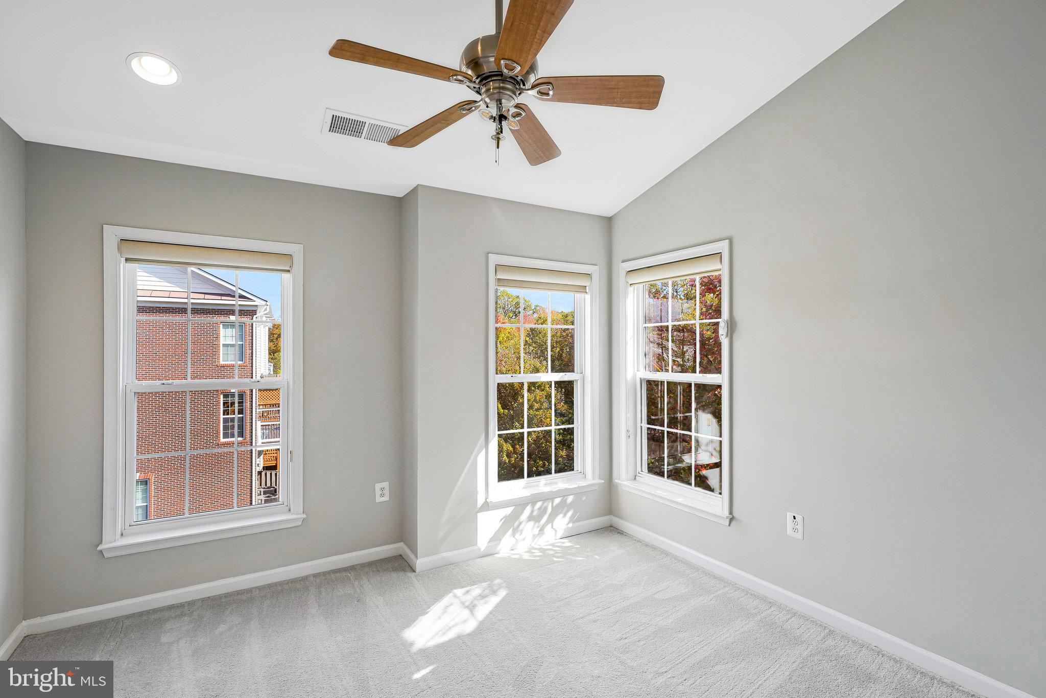 2478 Silk Court Herndon, VA 20171 - Photo 21 of 32 a view of an empty room with a window