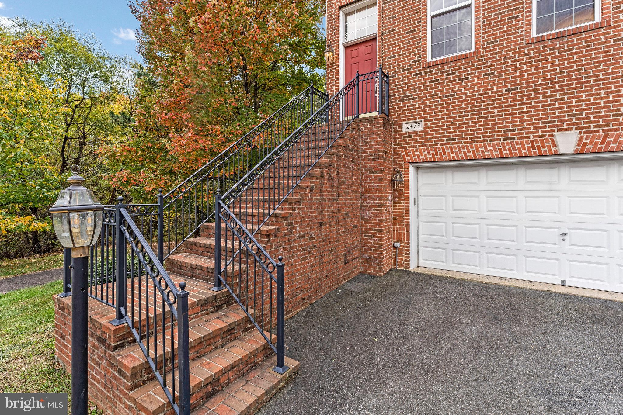 2478 Silk Court Herndon, VA 20171 - Photo 31 of 32 a view of a house with backyard and deck