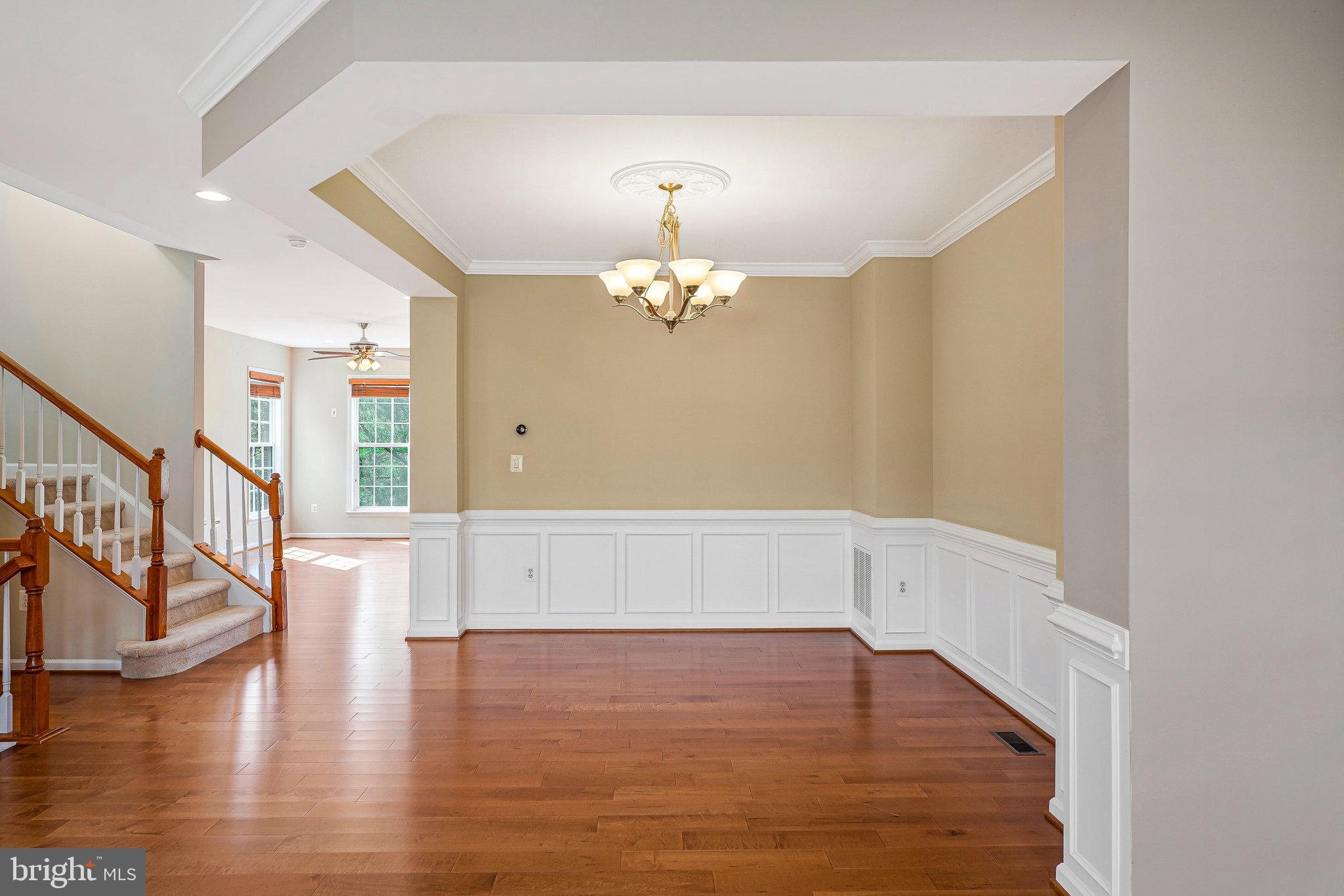 2478 Silk Court Herndon, VA 20171 - Photo 4 of 32 a view of an entryway with wooden floor
