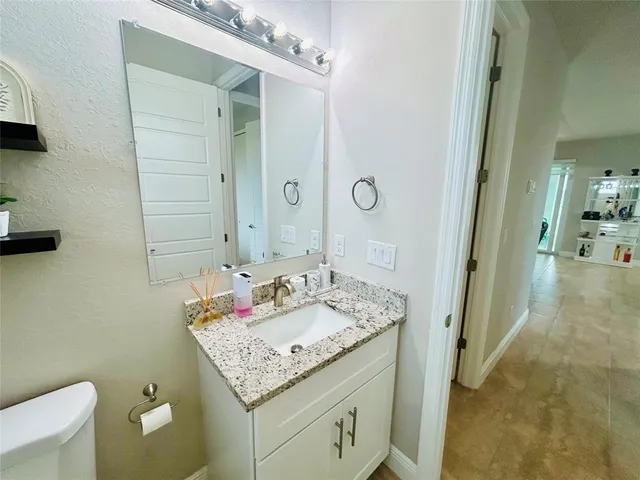 a bedroom with a bed and closet