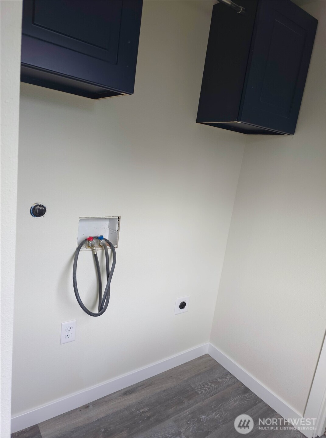 1303 30th Street, Unit 23 Seaview, WA 98644 - Photo 15 of 24 a bathroom with a sink and a mirror