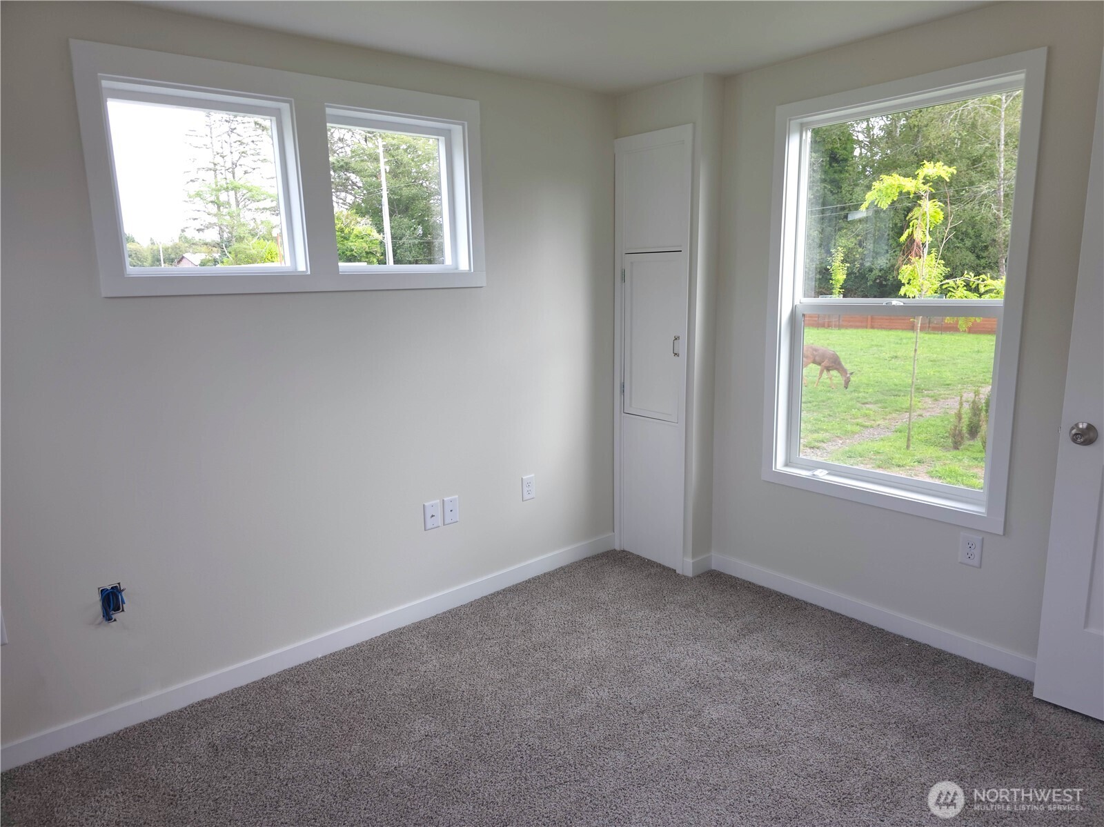 1303 30th Street, Unit 23 Seaview, WA 98644 - Photo 17 of 24 an empty room with a window