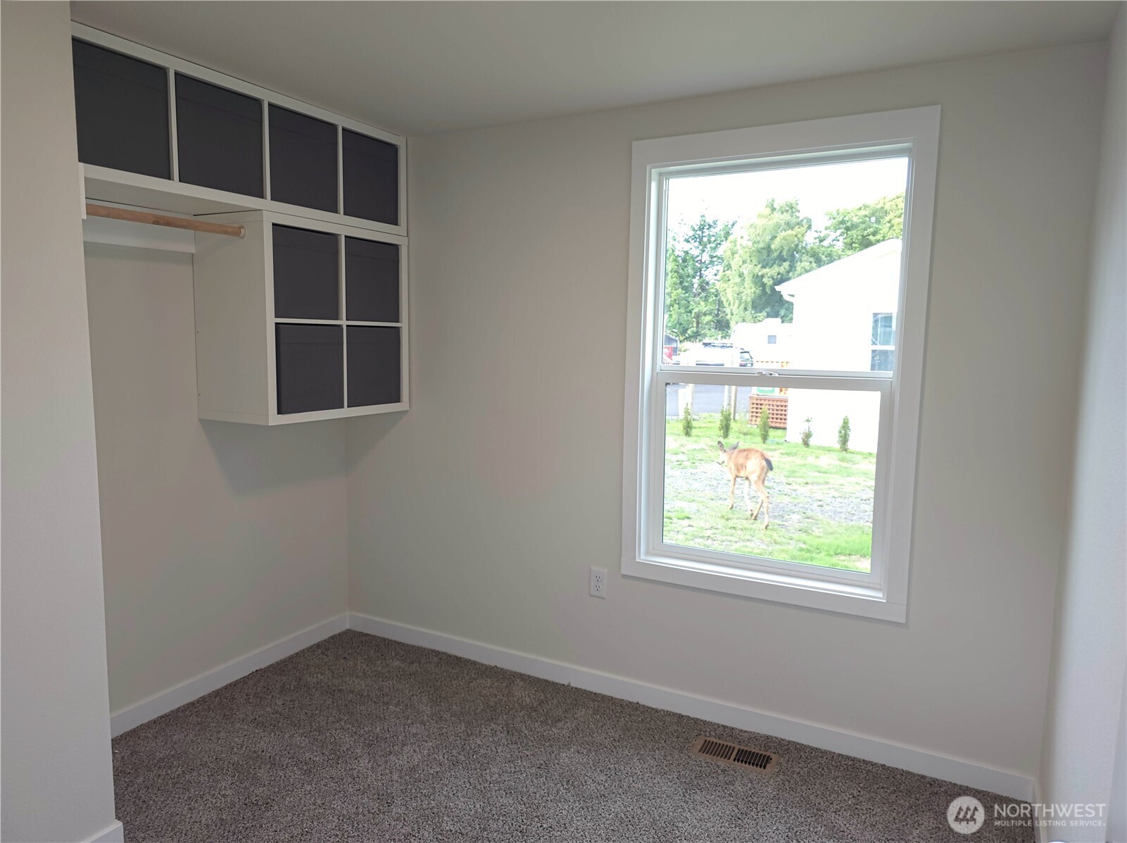 1303 30th Street, Unit 23 Seaview, WA 98644 - Photo 18 of 24 an empty room with a window