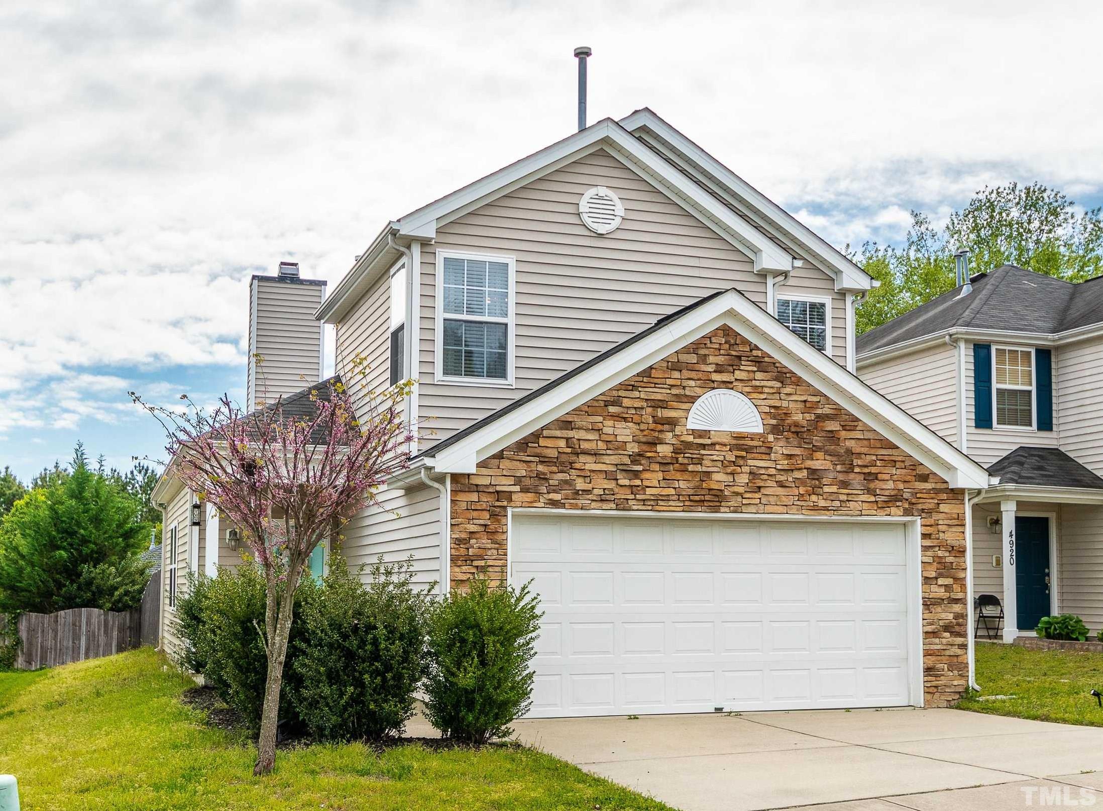 4924 Mocha Lane Raleigh, NC 27616 - Photo 1 of 16 a view of a house with a yard