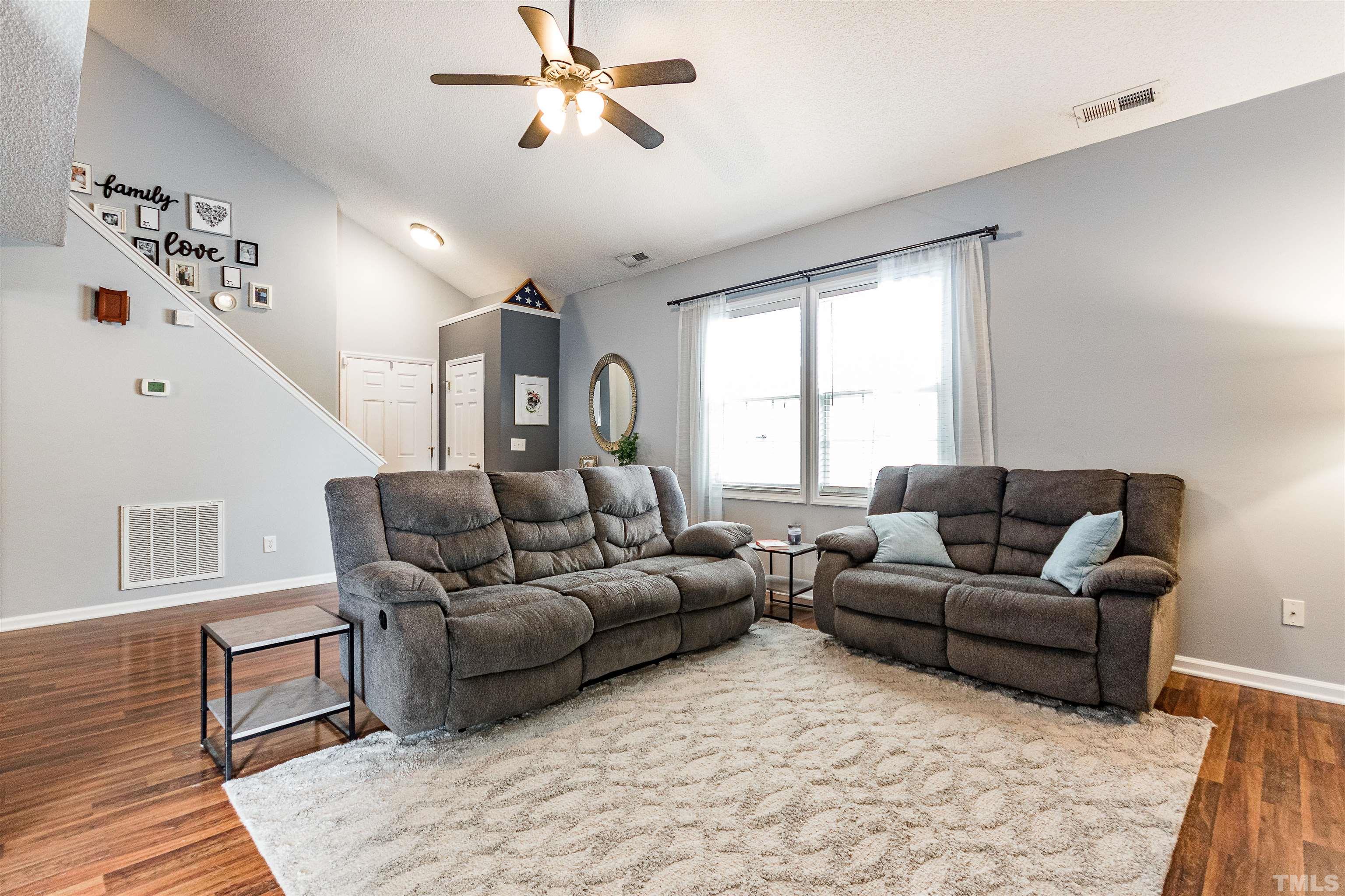 4924 Mocha Lane Raleigh, NC 27616 - Photo 3 of 16 a living room with furniture and a window