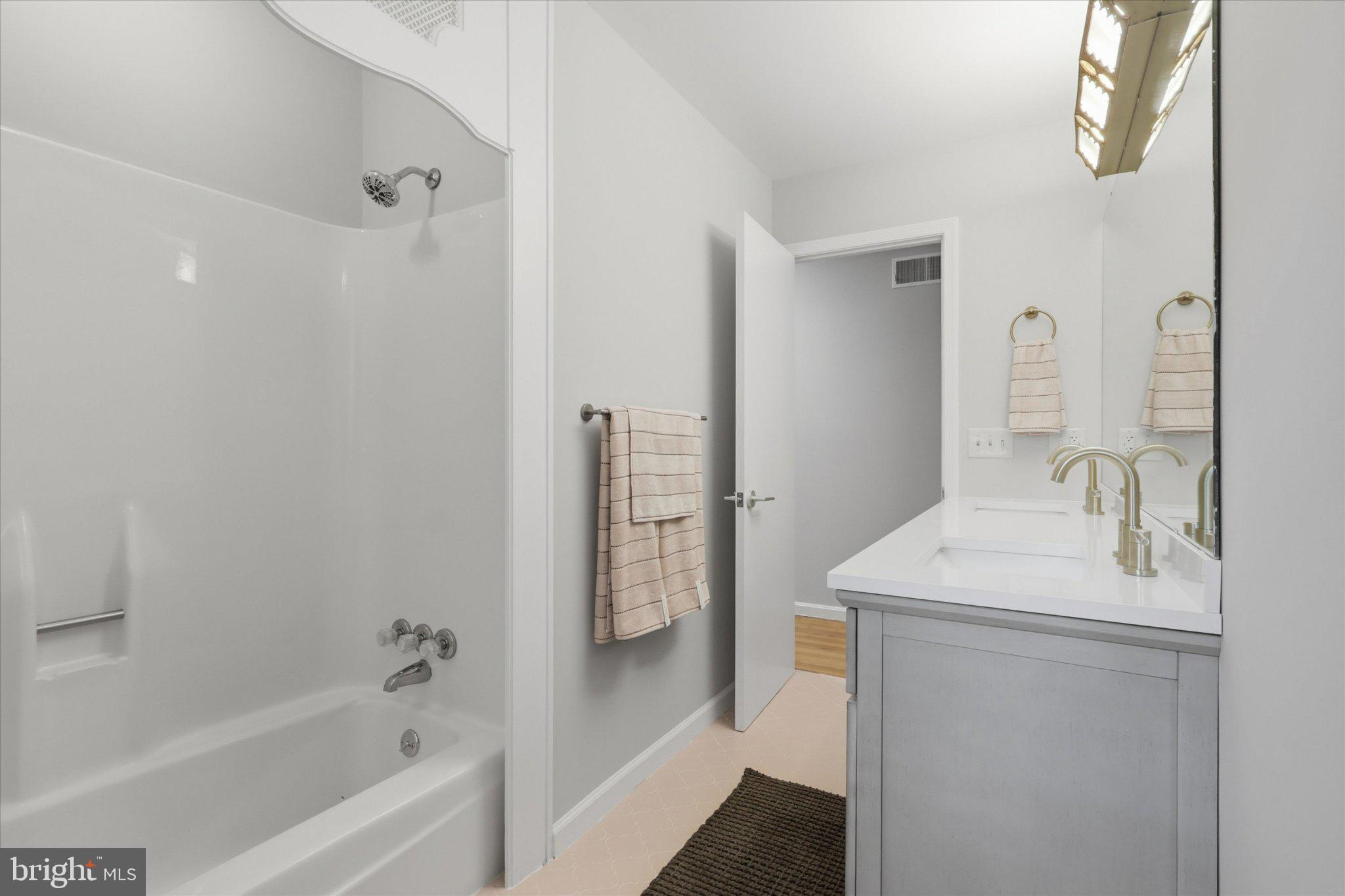 7007 Runnymeade Court Frederick, MD 21702 - Photo 21 of 37 Sleek and modern bathroom retreat.