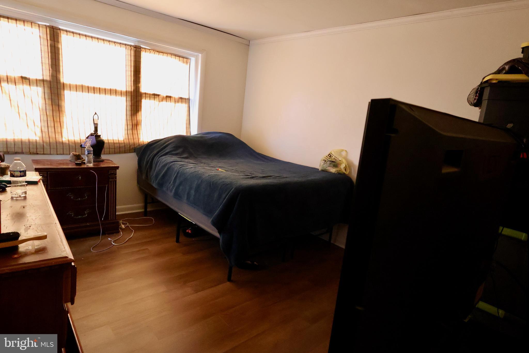 1239 Wabank Road Lancaster, PA 17603 - Photo 15 of 31 a bed sitting in a bedroom next to a window