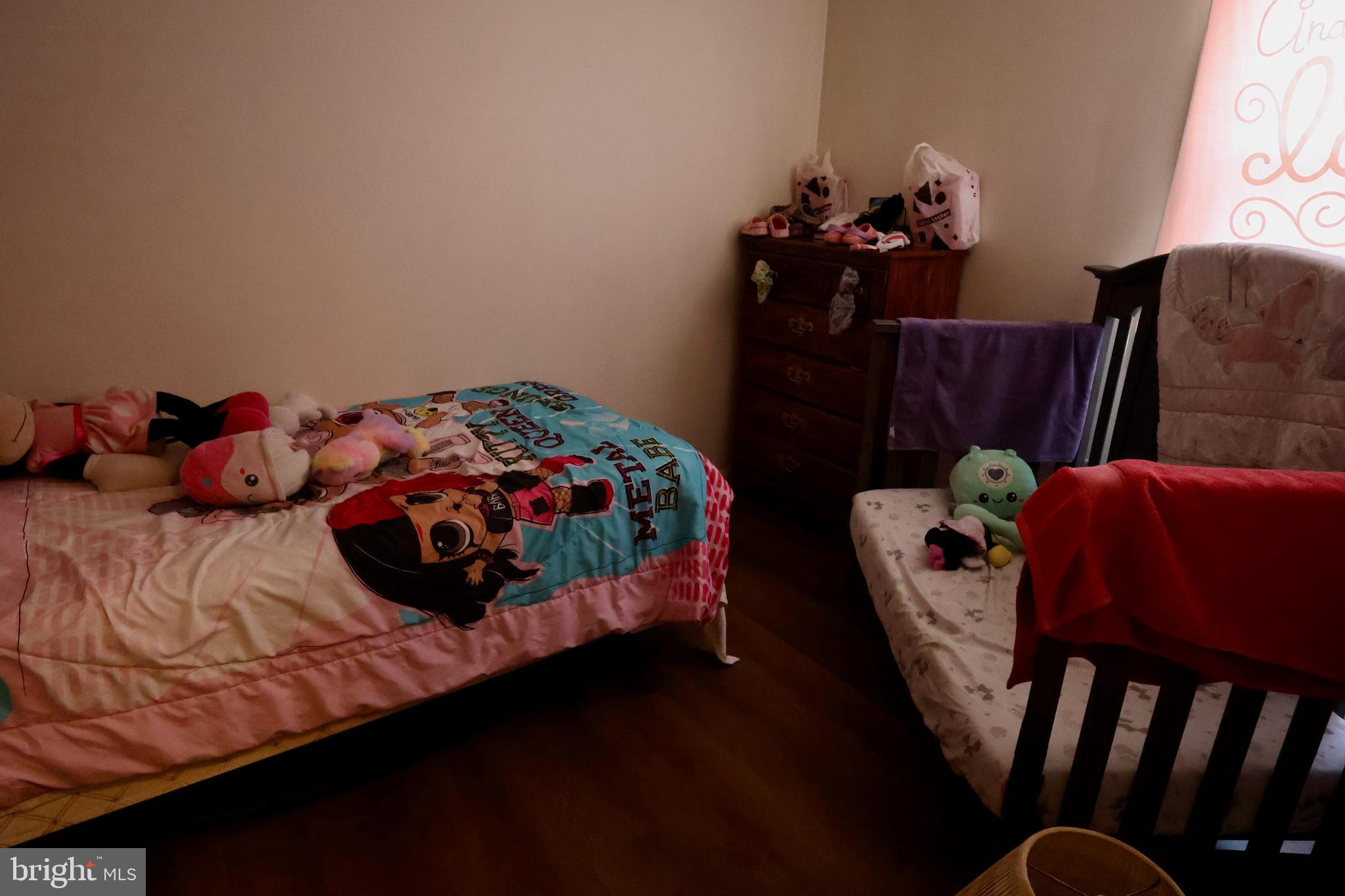 1239 Wabank Road Lancaster, PA 17603 - Photo 17 of 31 a bedroom with two beds and a potted plant