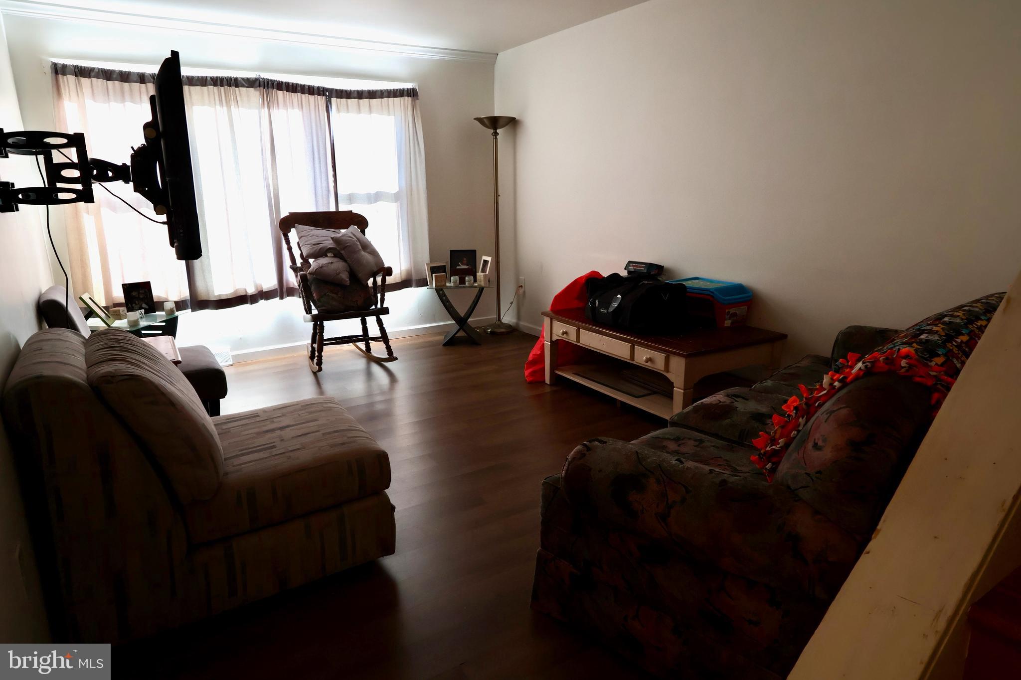 1239 Wabank Road Lancaster, PA 17603 - Photo 2 of 31 a living room with furniture and a flat screen tv