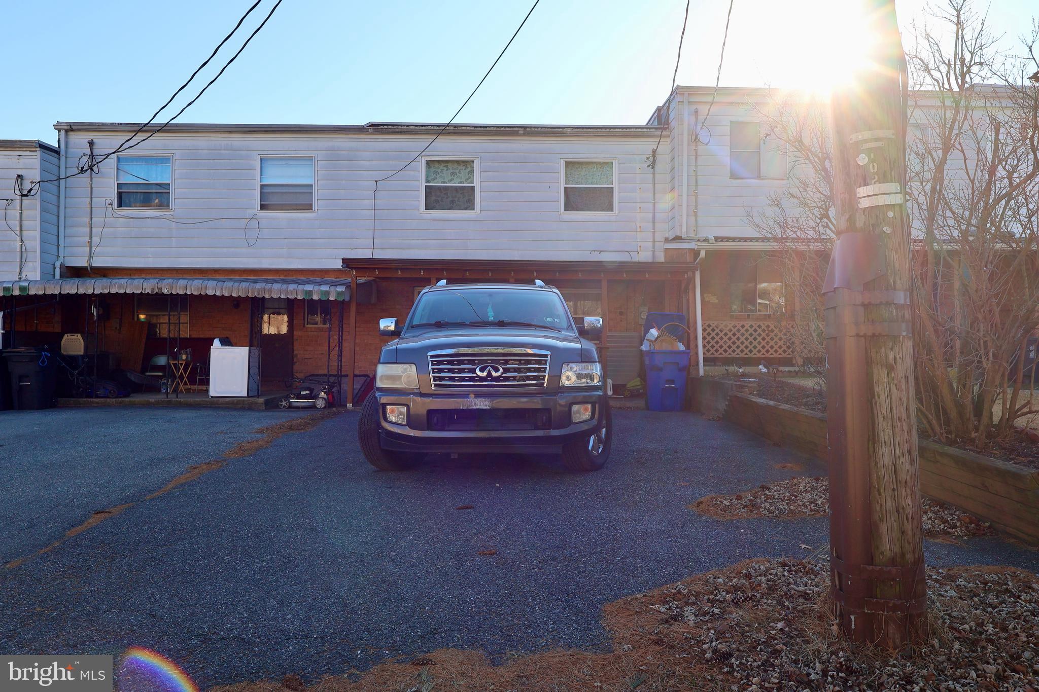1239 Wabank Road Lancaster, PA 17603 - Photo 31 of 31 a car parked in front of a house