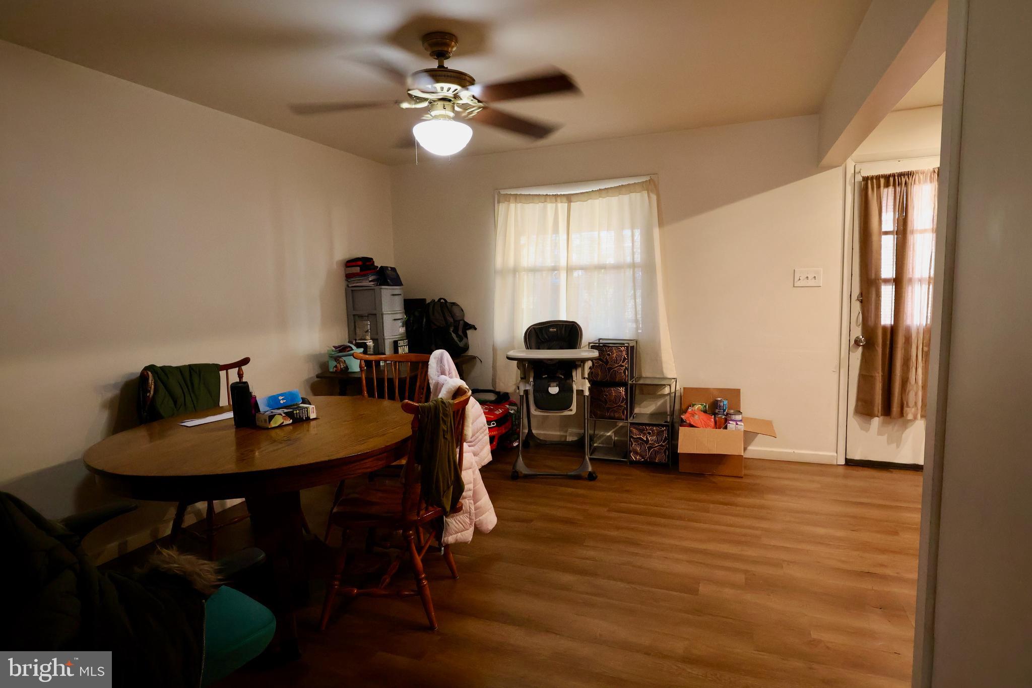 1239 Wabank Road Lancaster, PA 17603 - Photo 4 of 31 a view of a dining room with furniture window and wooden floor