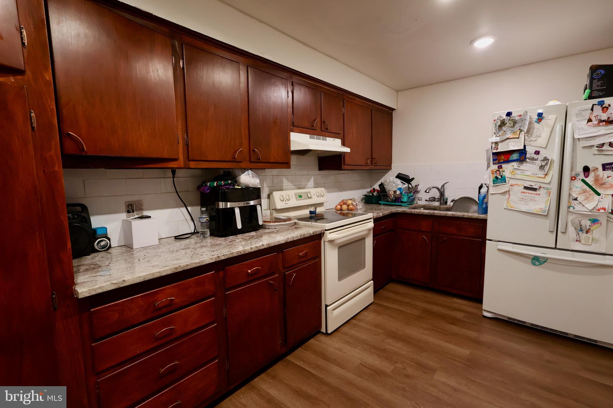1239 Wabank Road Lancaster, PA 17603 - Photo 7 of 31 a kitchen with a sink cabinets and appliances