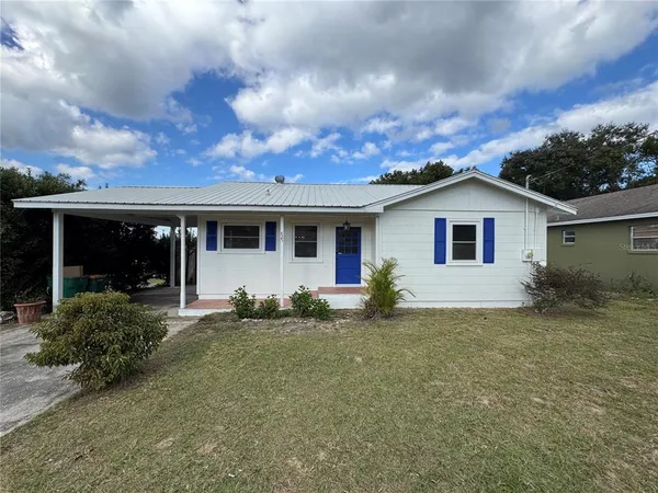 front view of house with a yard