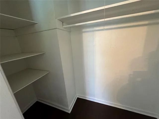 a view of an empty walk in closet