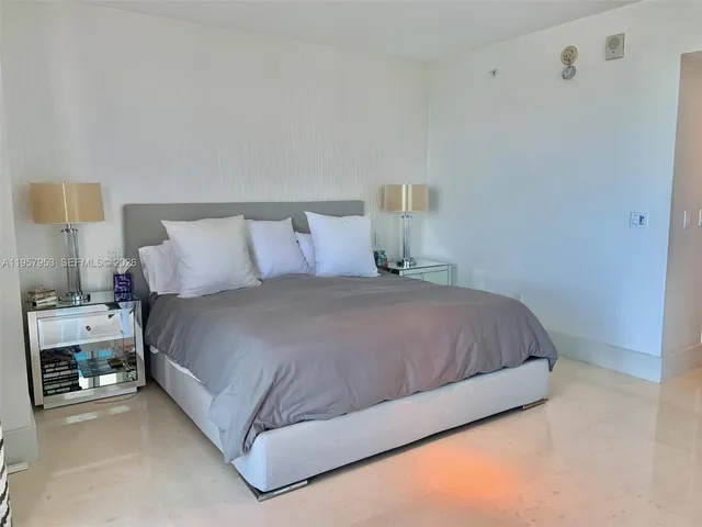 a bathroom with a sink double vanity and a toilet