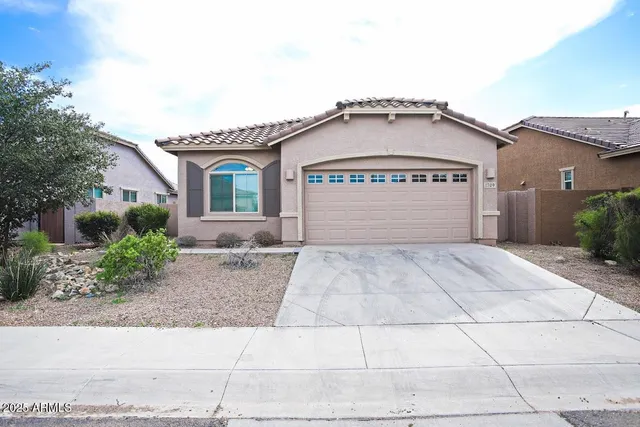 a view of front of house with garage