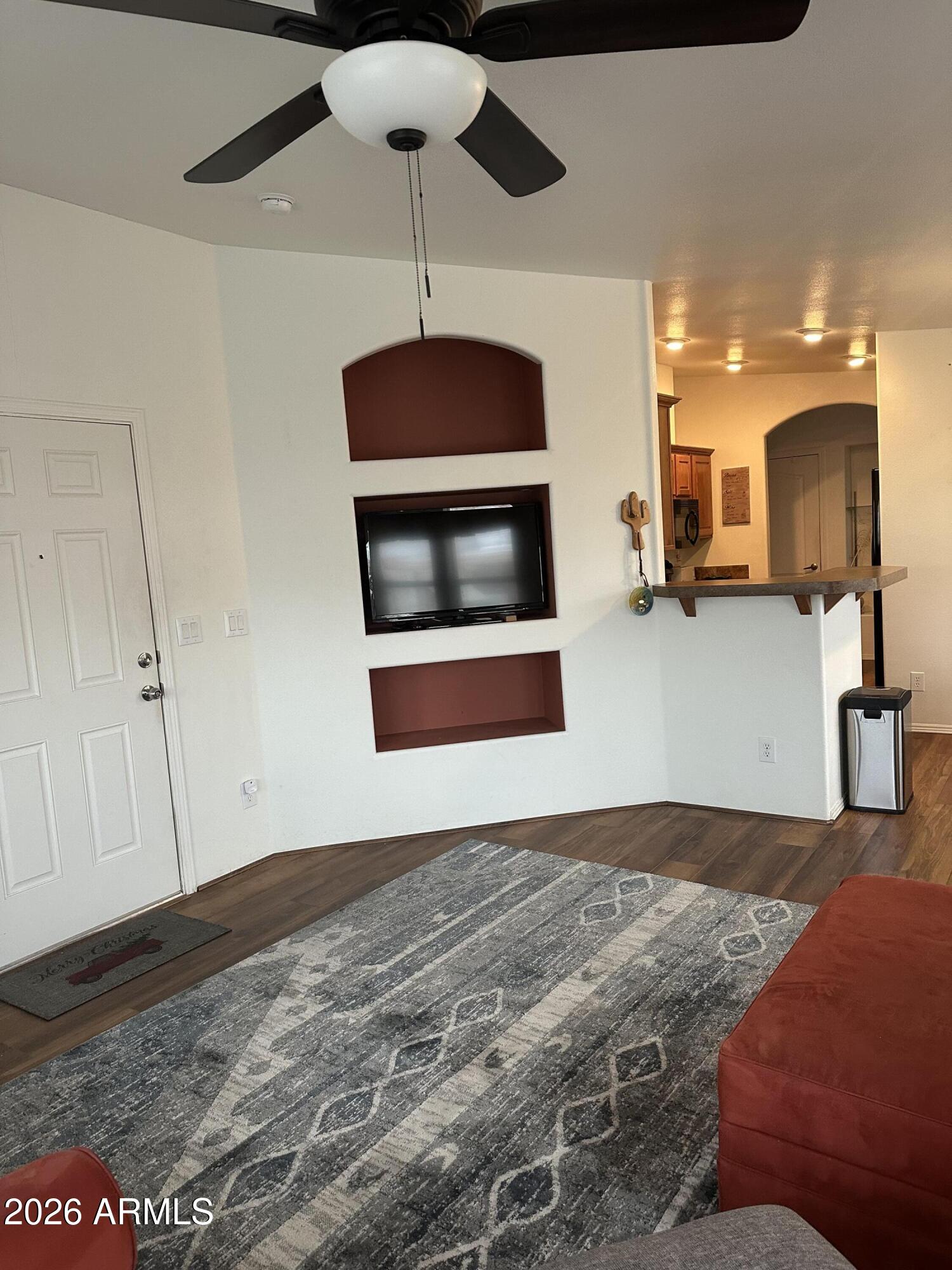 17200 West Bell Road, Unit 1658 Surprise, AZ 85374 - Photo 3 of 16 a bedroom with a bed and a dresser