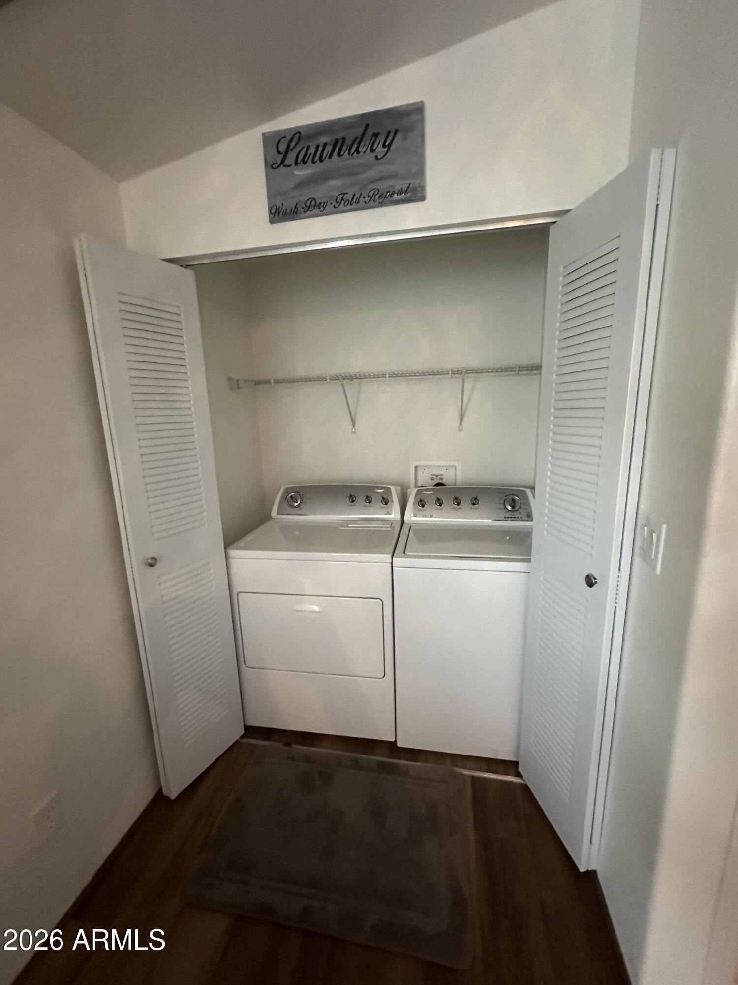 17200 West Bell Road, Unit 1658 Surprise, AZ 85374 - Photo 8 of 16 a utility room with dryer and washer