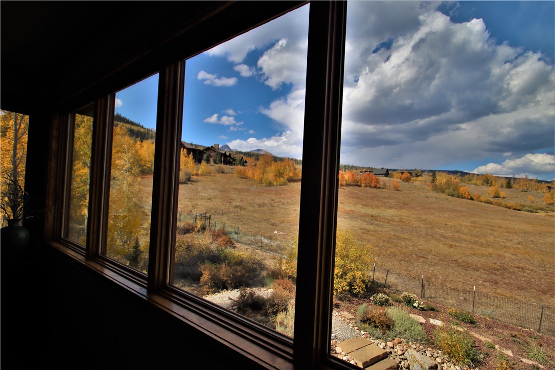 135 Game Trail Road Silverthorne, CO 80498 - Photo 8 of 34 Large windows in dining are to take in the view.