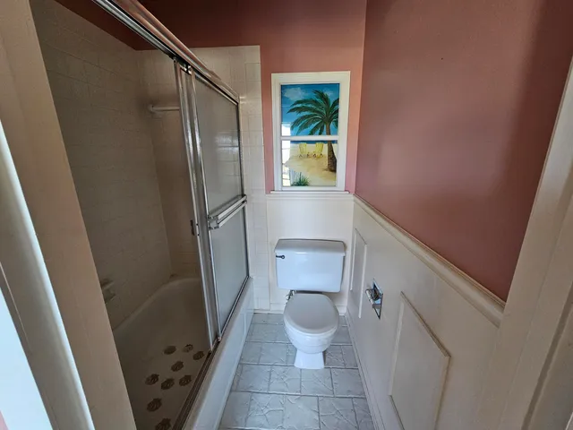 a bathroom with a sink and toilet