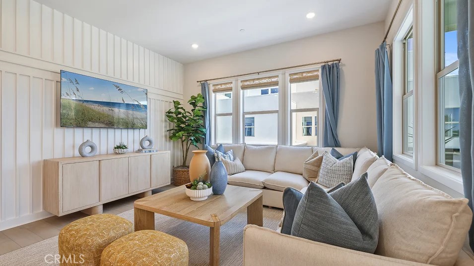 925 Walnut Terrace Montebello, CA 90640 - Photo 12 of 33 a living room with furniture a flat screen tv and a window