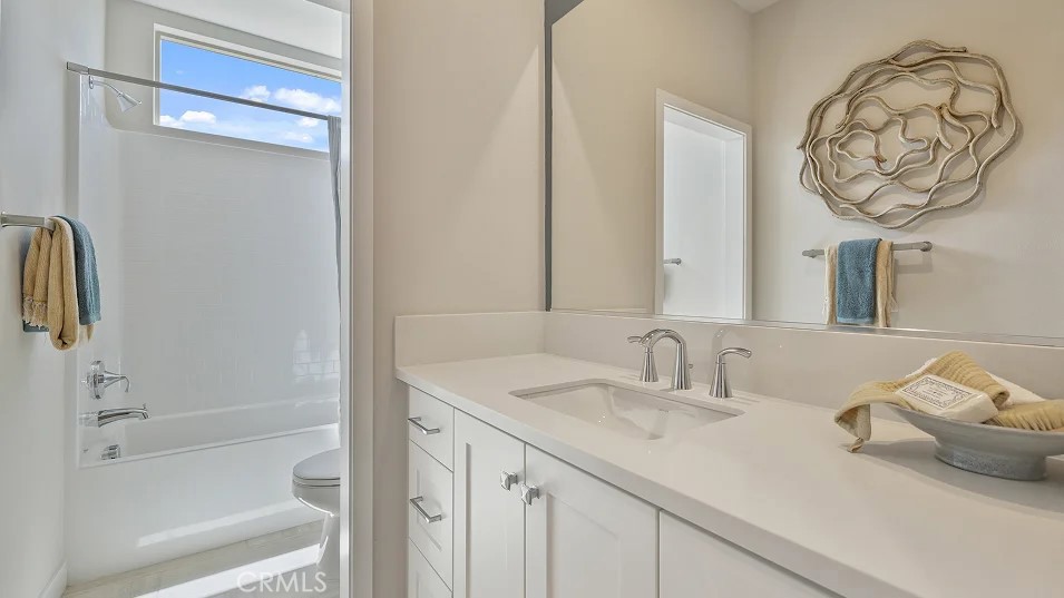 925 Walnut Terrace Montebello, CA 90640 - Photo 21 of 33 a bathroom with a sink and a mirror